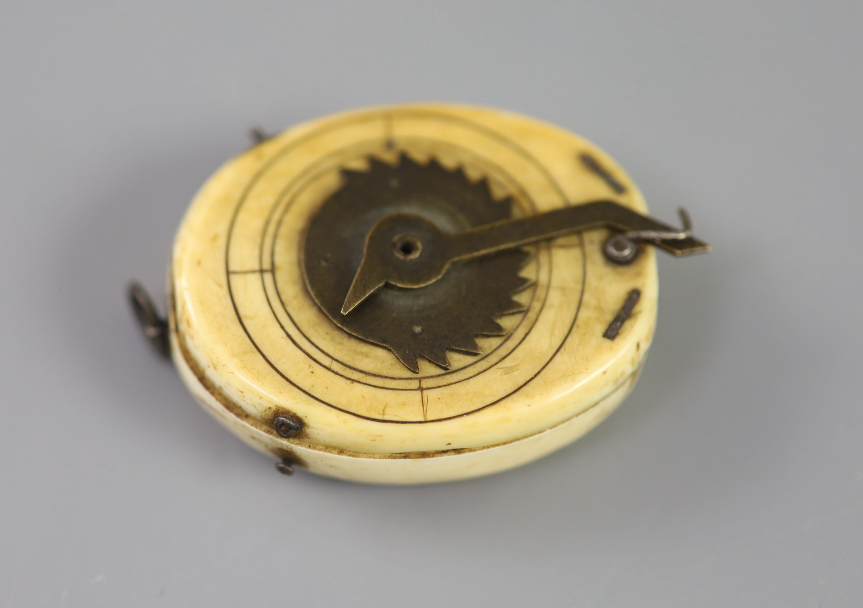 A rare late 16th century German oval ivory diptych-dial, width 39mm depth 48mm length 48mm